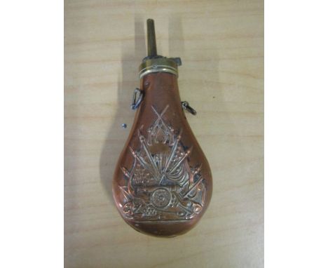 A copper musket powder flask