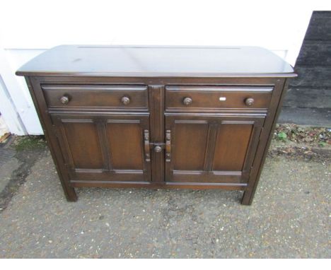 Ercol sideboard with 2 drawers and 2 door cupboard H84cm W124cm D48cm approx