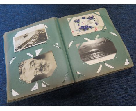Blue vintage album containing original varied mixture, many better noted (approx 180 cards)