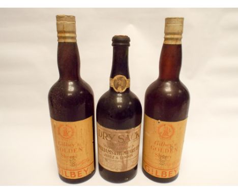 Two vintage bottles of Gilbey's golden sherry and a bottle of Dry Sack sherry 