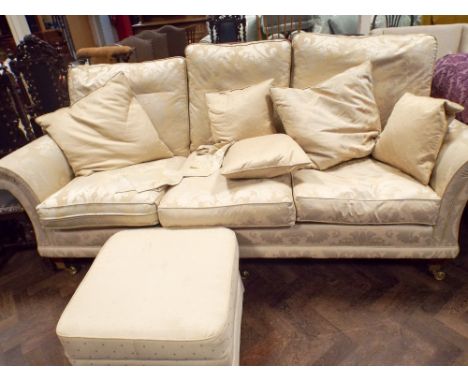 An excellent 3 seater settee in cream patterned material with loose cushions and matching pouffe 