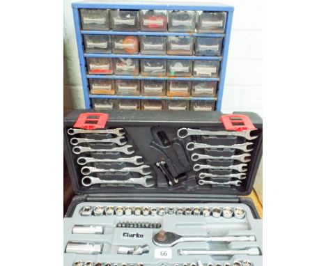 A multi drawer storage unit containing screws, nuts bolts etc and a toolbox with a fitted spanner set