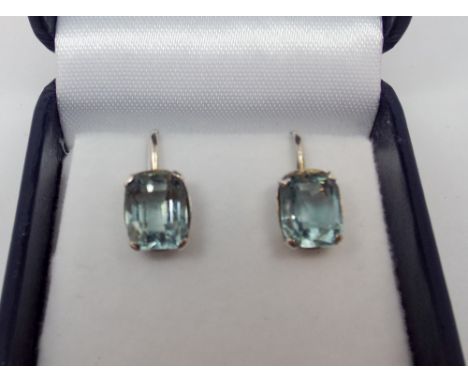 Pair of vintage blue stone screw fitting earrings 