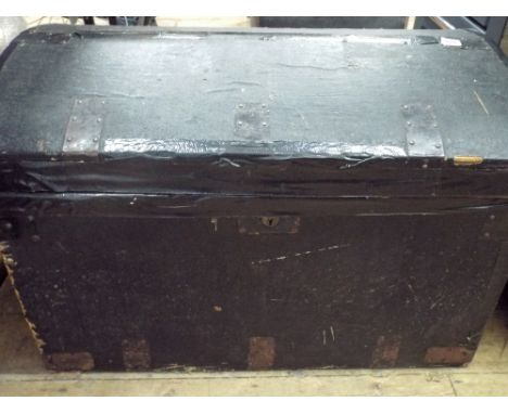 A large black domed trunk 