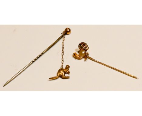 Two collectable stick pins, one modelled as a gem set Cockerel, the other with kangaroo. Kangaroo model stamped 9ct