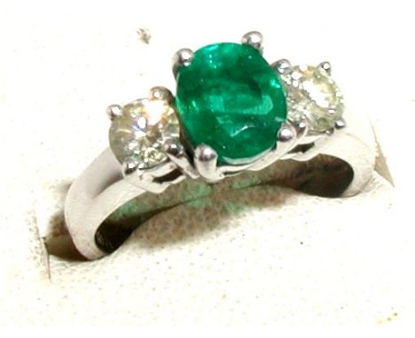 Three stone emerald and diamond ring set in 18ct white gold, ring size K/L