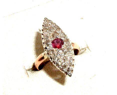 19th century marquis panel ring set with pave diamonds and a central ruby on a rose gold unmarked shank, ring size F/G