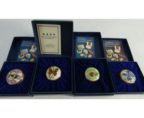 Group of four Halcyon Day enamel boxes of circular form with relief molded lids depicting butterflies, bees and bugs, all box