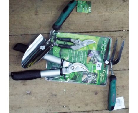 New 2 piece stainless steel shear set and a new stainless steel hand trowel and fork 