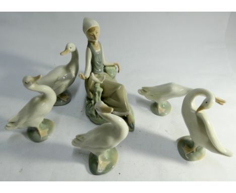 Lladro porcelain figurine of a seated lady and five geese