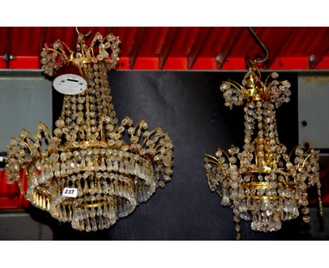 Two gilt and crystal drop chandelier light fittings, H. 40cm.