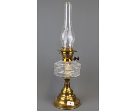A Victorian brass and glass oil lamp, H. 56cm.