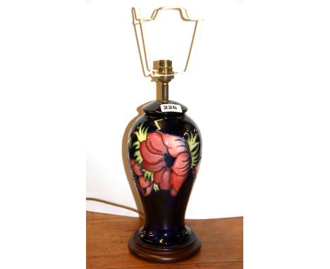 A Moorcroft pottery table lamp, H. 37cm.