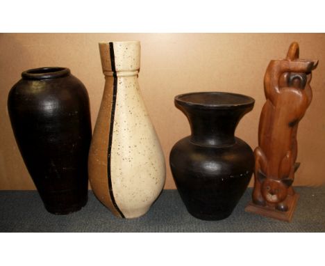 Three large pottery vases and a wooden cd rack, largest 71cm.