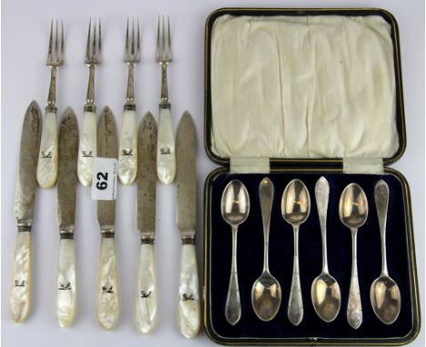 A boxed set of six hallmarked silver coffee spoons together with nine mother of pearl and hallmarked silver cutlery items.