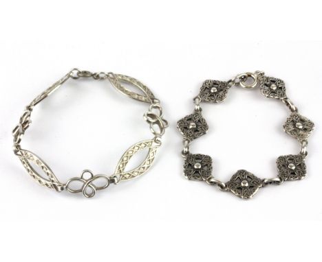 Two hallmarked silver Celtic bracelets, L. 17cm.