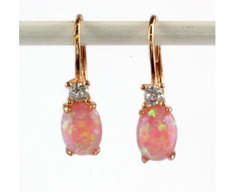 A pair of 925 silver rose gold gilt earrings set with synthetic pink opal and white stones, L. 2cm.