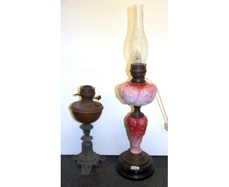 A Victorian opaline glass oil lamp converted for use with electricity, overall H. 76cm together with a further oil lamp base.