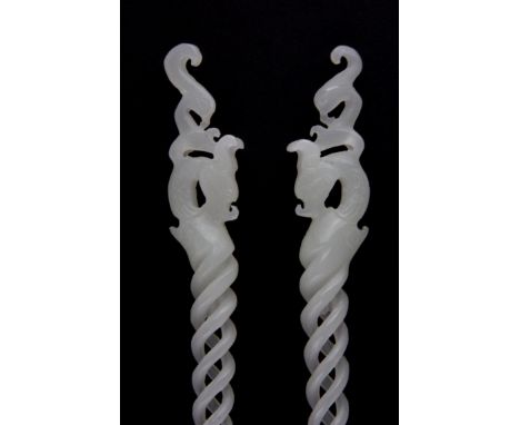 A pair of exquisite Chinese white jade hair pins with open spiral decoration, L. 25.5cm.