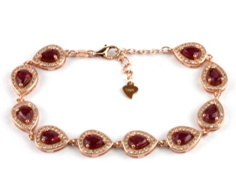 A 925 rose gold gilt pear cut ruby and white stone set bracelet, L. 20cm.