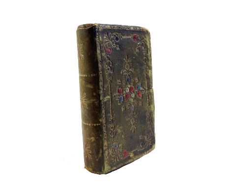 NEEDLE CASE in green cf. book form slipcase with tooled scroll pattern in gilt, red and blue enamel floral decorations, a.e.g