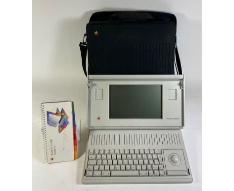 APPLE MACINTOSH PORTABLE M5120 (1989). The first Apple laptop, mains-independent with built-in battery, 40 MB hard disk, 3.5-
