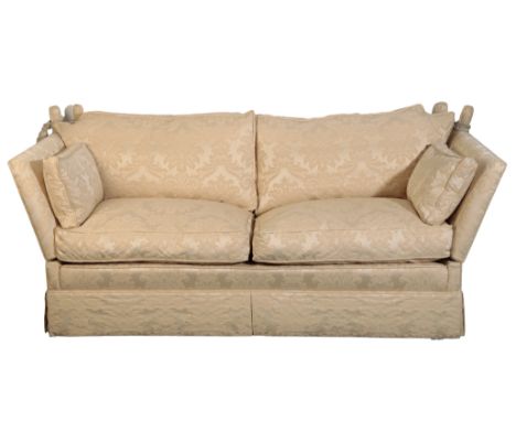 A TWO SEAT KNOLE SOFA 20th century, with light damask covers, on castors, 88cm high x 195cm wide x 92cm deep