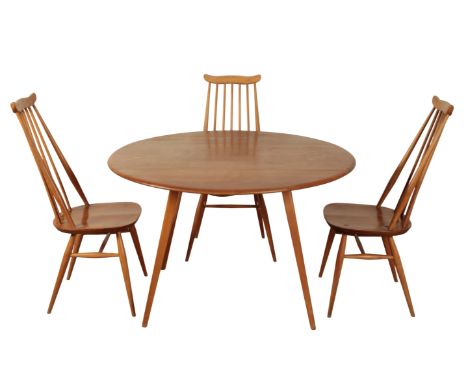 AN ERCOL BLOND ELM OVAL DROP LEAF DINING TABLE with square tapered angled legs, sold together with a set of four Ercol blond 