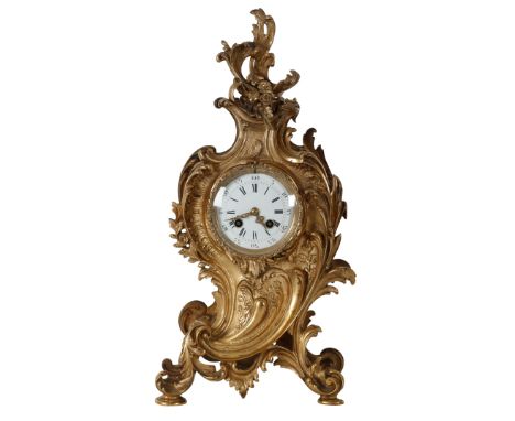 A FRENCH ORMOLU MANTLE CLOCK OF LOUIS XVI DESIGN 20th Century, of typical leaf capped balloon shape, striking on a bell, 47cm