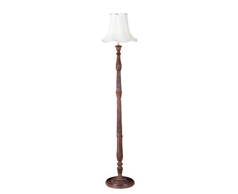 A KASHMIRI CARVED MAHOGANY ELECTRIC STANDARD LAMP with all over floral decoration, 168cm high, the base 32cm diameter, with c