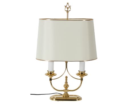 A 20TH CENTURY FAUX BRASS TWIN SCONCE ELECTRIC TABLE LAMP of 19th Century style, with cream shade and candle style fitments, 