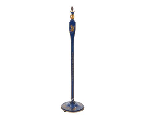 A 1920'S CHINOISERIE STANDARD LAMP painted in gilt and colours with standing figure and flowers on a blue ground, with bakeli