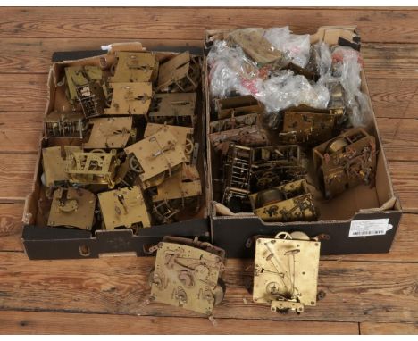 Two boxes of assorted mantle clock movements with examples including Smiths &amp; Enfield