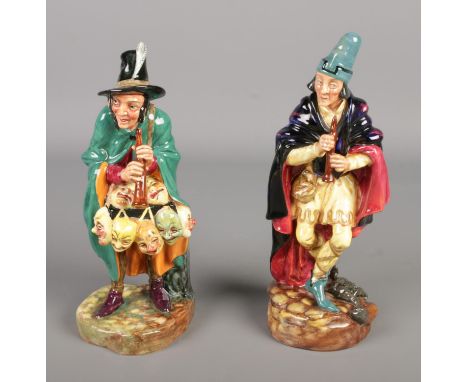 Two Royal Doulton ceramic figures: The Pied Piper (HN2102) and The Mask Seller (HN2103). Approx. height of tallest example 23
