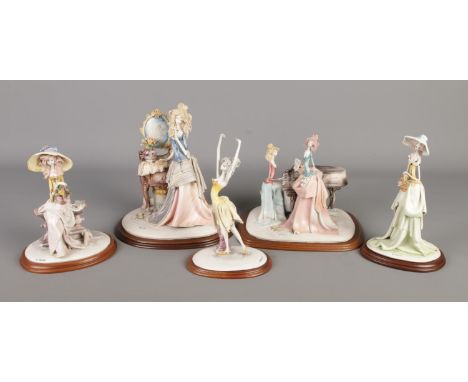 A good collection of Emilio Tezza Italian ceramic figures to include woman with vanity, piano player, ballet dancer, etc all 