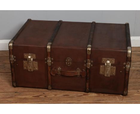 A large vintage wooden bound travel steamer trunk. Height 36cm, Width 79cm, Depth 50cm.  Wood worm to bands.