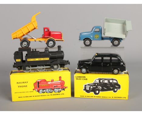 Four Budgie die-cast vehicles; consisting of No. 224 Railway Engine (boxed), No. 101 London Taxi Cab (boxed), No. 242 Euclid 