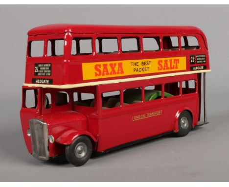 A Tri-ang friction-powered London Transport double decker bus, No. 25 'Aldgate', bearing Kelloggs and Saxa Salt livery.  Mech