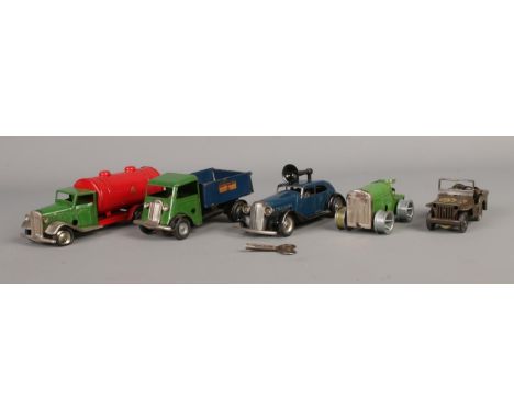 A collection of Tri-ang clockwork tin-plate vehicles. To include Traffic Control car, Minic Transport Express Service tipper,
