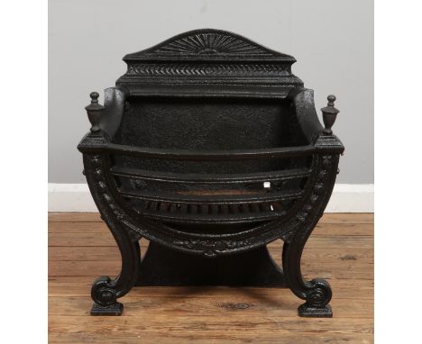 A Regency cast iron fire grate.