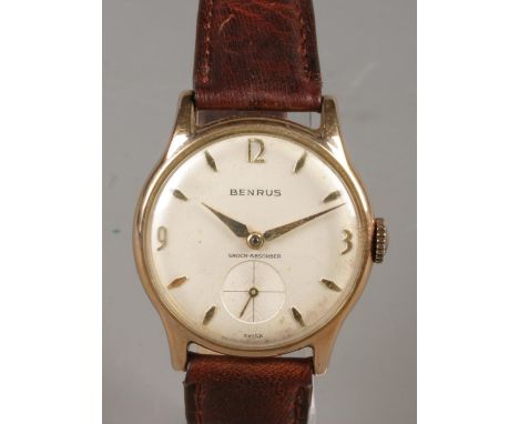 A gents gold plated stainless steel Benrus manual wristwatch. With baton and Arabic numeral markers and subsidiary seconds.  
