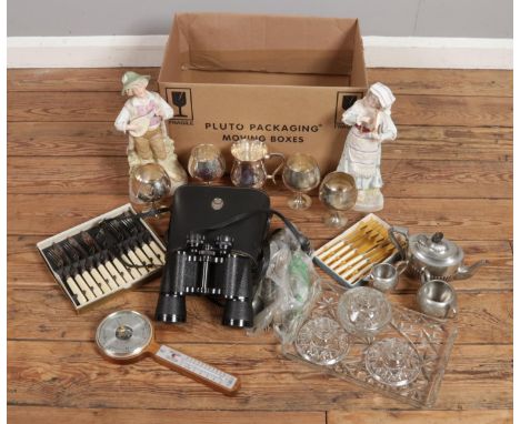 A box of miscellaneous. Includes pair of ceramic figures, Sheffield pewter tea set, Prinz binoculars, barometer, dressing tab