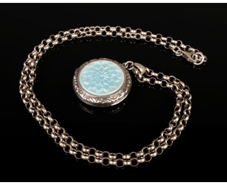 A silver locket necklace featuring a light blue enamel front with a floral guilloche pattern.  Hallmarked 925 and Silver. Cha