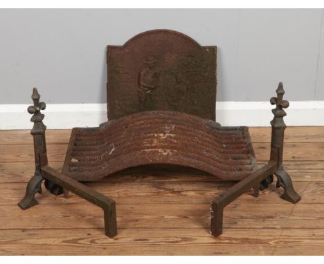 A collection of cast iron fire metal wares. To include a pair of 'Pevex' fire dogs, grate and back plate bearing 'Armoricaine