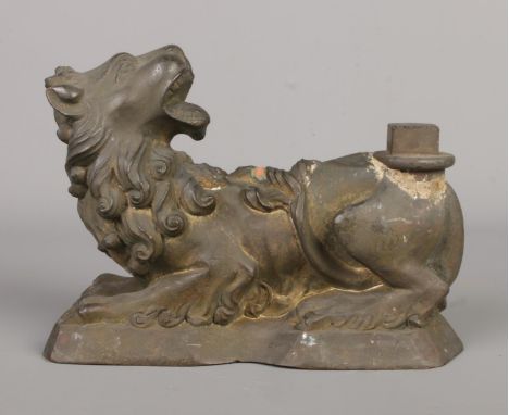 A bronze casting pattern of recumbent lion, possibly for a fire dog/andiron. Height 13cm, Length 18cm.