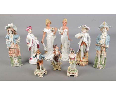 A collection of ceramic figurines including Leonardo Collection and Continental examples.