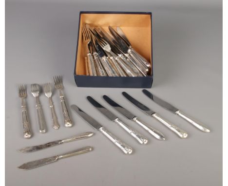 A collection of silver plated flatware, including a group of eighteen knives by Harrison Bros &amp; Howson Cutlers to Her Maj