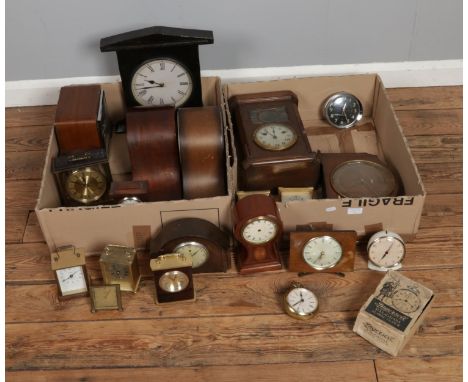 Two boxes of assorted mechanical and quartz clocks to include Westclox, Cyma, Smiths, Ingersoll, Garrard, etc.