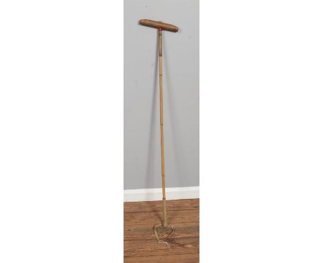 A vintage bamboo handled polo mallet.