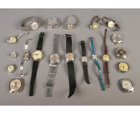 A box of mixed ladies and gents manual wristwatches